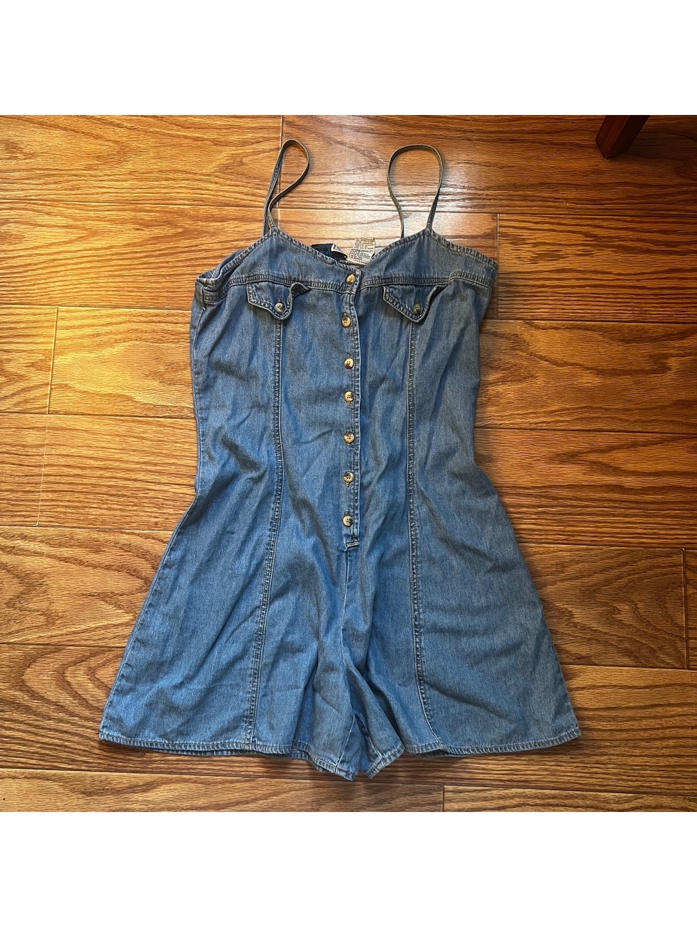 vintage denim romper with button front and adjustable straps